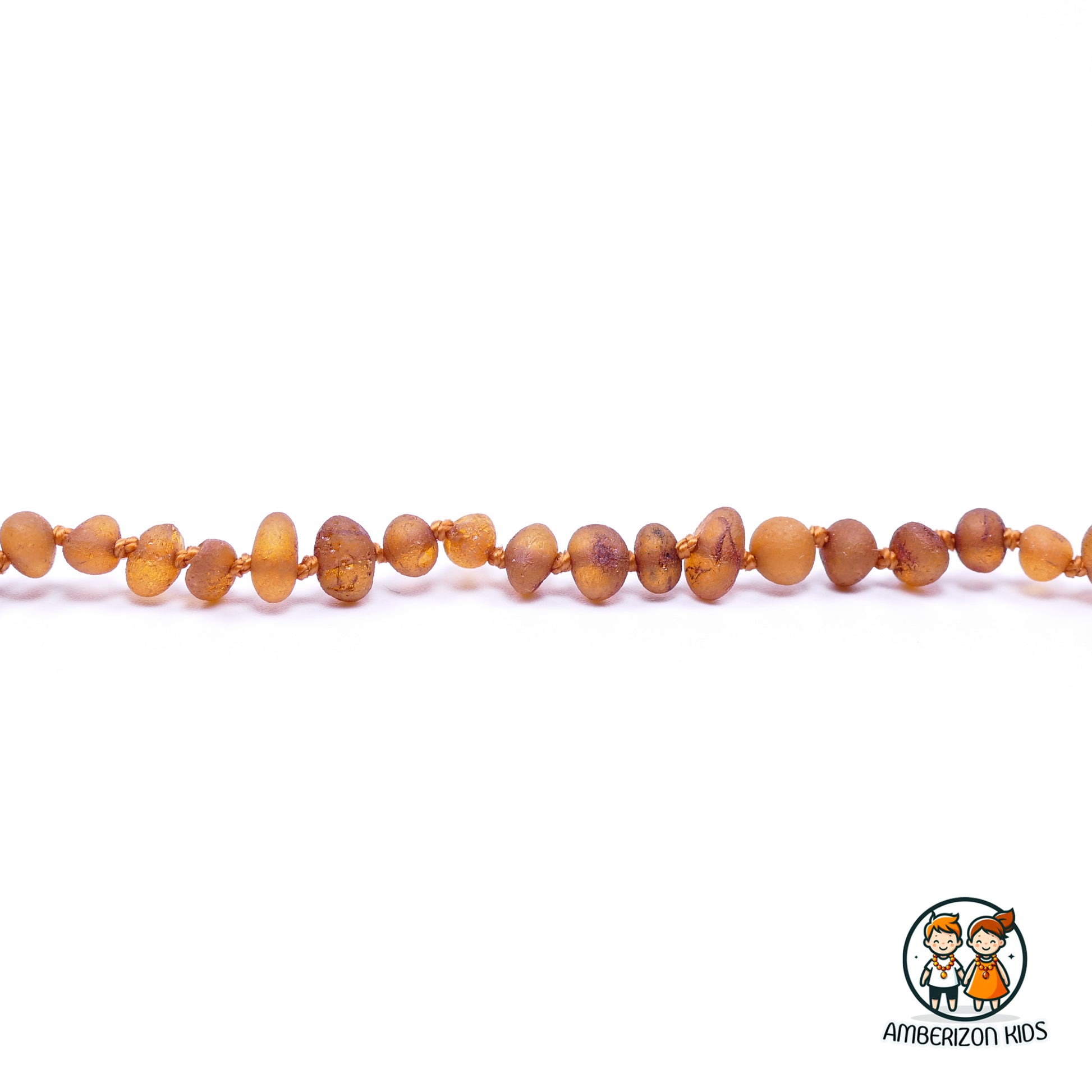 Amber Charm: Raw Baltic Amber Baby Necklace with Rusty Tones
