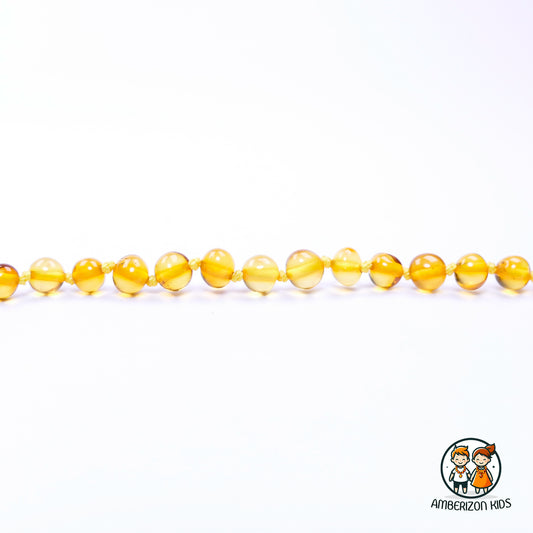 Polished amber baby necklace - Unisex - Clear translucent lemon color beads