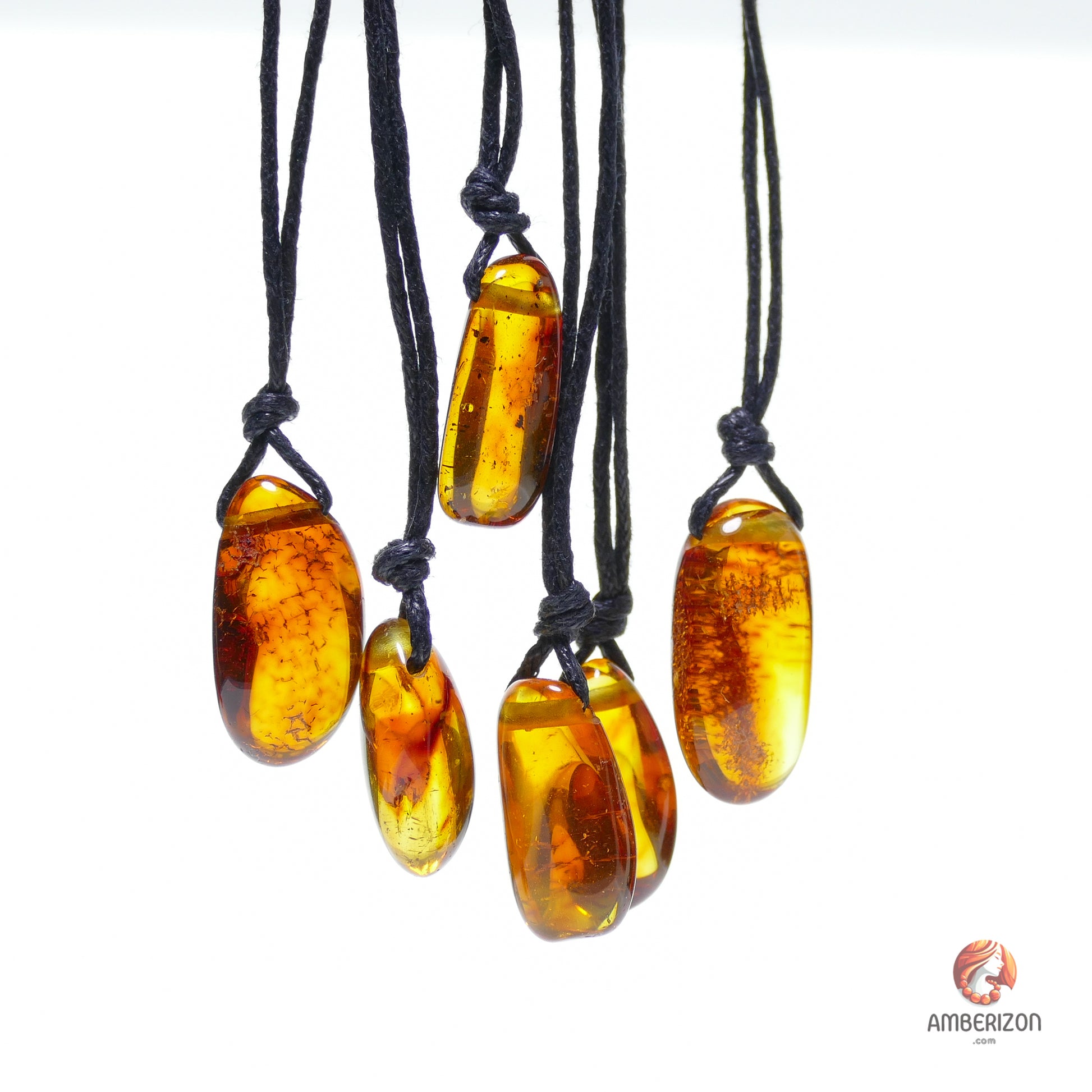 Baltic amber drop pendant - Freeform cognac color stone