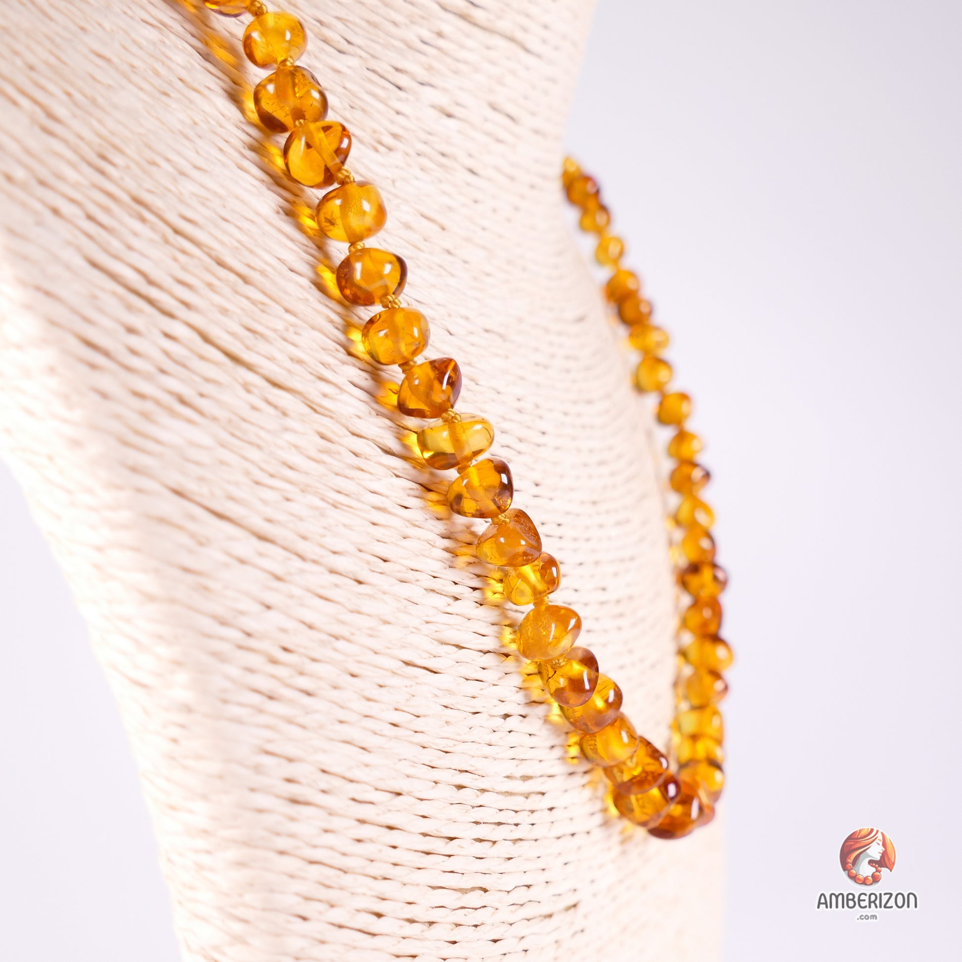 Women's necklace - Clear polished baroque amber beads - Honey color