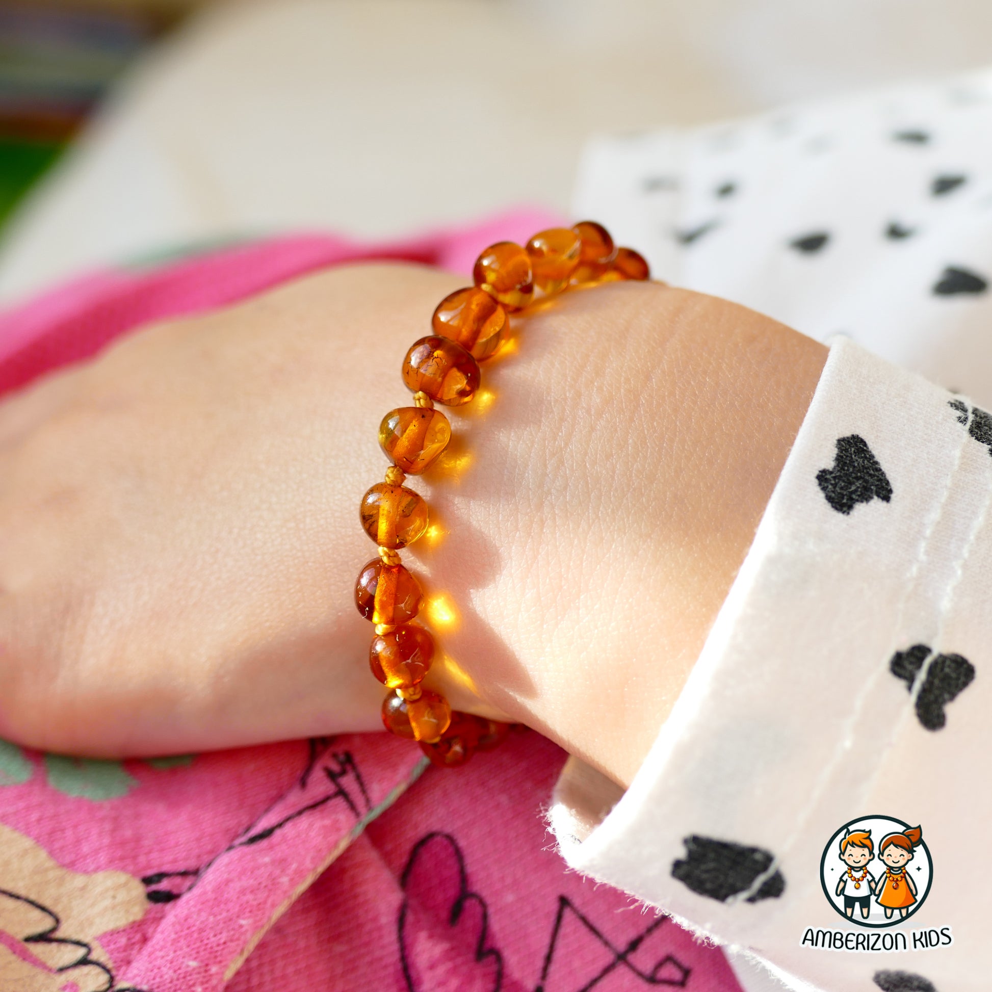 Knotted cognac amber baby bracelet - anklet - Translucent baroque beads