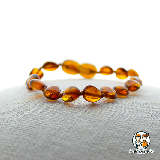 Polished cognac color amber baby bracelet-anklet - Clear translucent beads