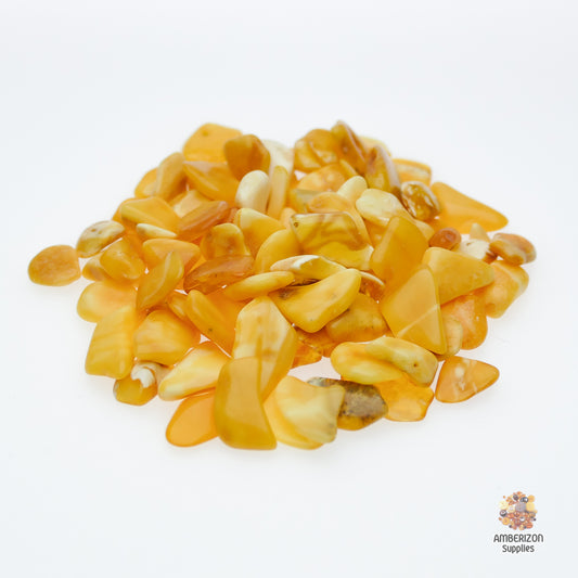 Flat butterscotch white tumbled Baltic amber chips stones pieces for jewelry and healing
