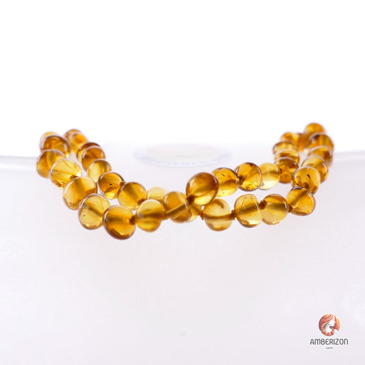 Women's necklace - Clear polished baroque amber beads - Honey color
