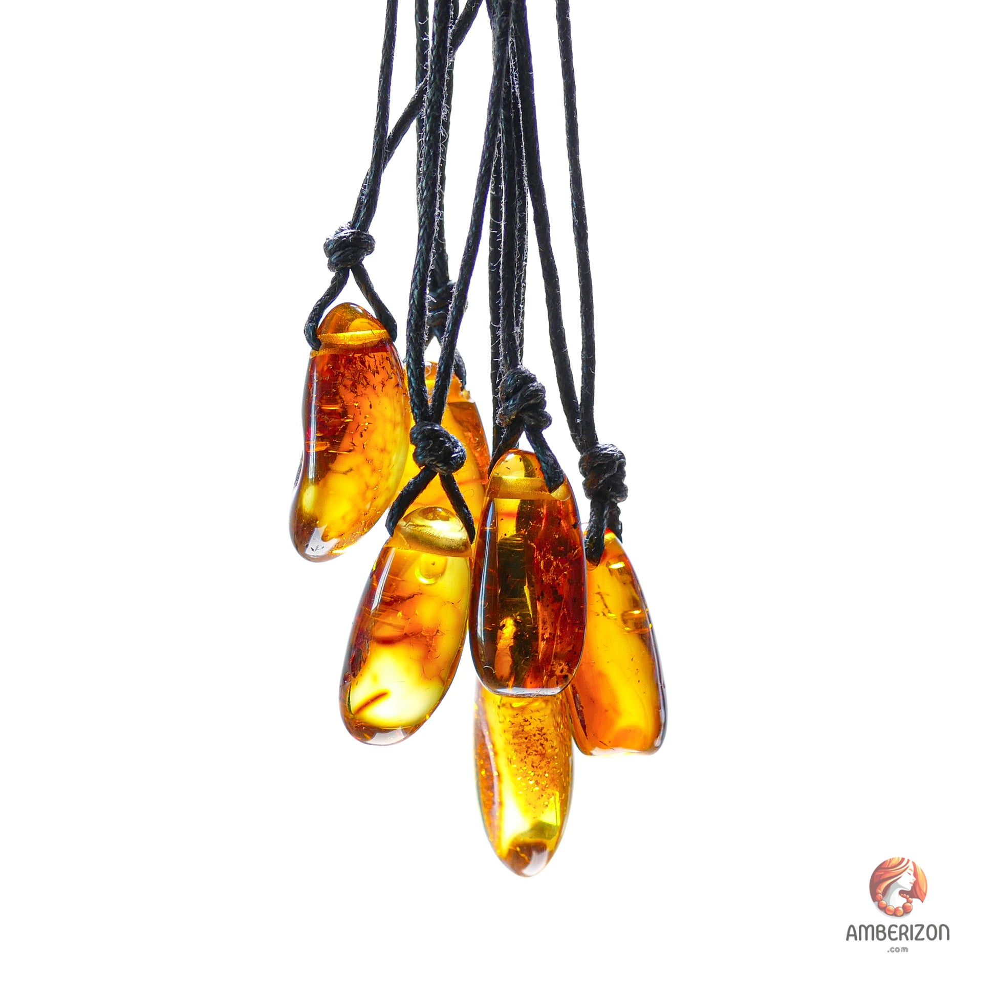 Baltic amber drop pendant - Freeform cognac color stone